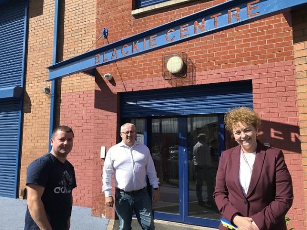 Communities Minister Carál Ní Chuilín pictured at the Blackie Centre with Sean Quinn, chairman of Blackie River Community Group and Community Development Coordinator Ciaran Beattie for the reopening of the COVID-19 Charities Fund