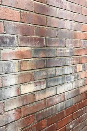 Water staining to a cavity brick wall c1920