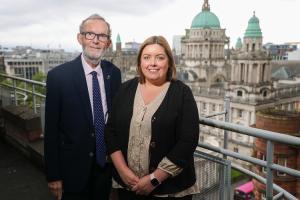 Communities Minister Deirdre Hargey is pictured with outgoing Discretionary Support Commissioner Walter Rader