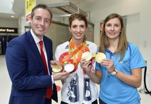 Sports Minister Paul Givan, MLA has welcomed swimmer Bethany Firth back to Northern Ireland after her historic performance in Rio. Also pictured is Elaine Reid from, Disability Sport NI.